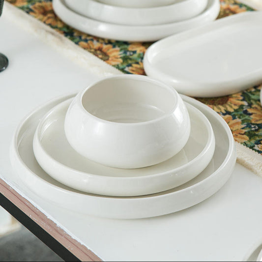 Three set of glossy bowls on the table