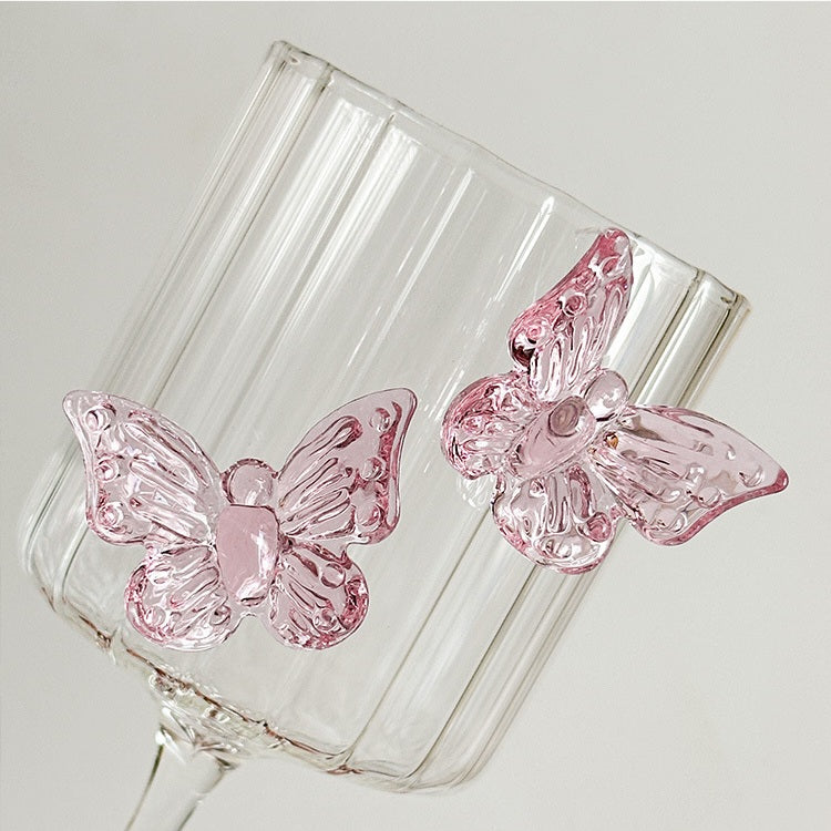 Designed for dreamers and romantics, each goblet boasts a clear, high-quality glass base with unique butterfly ornaments that make it as much art as it is functional drinkware.
