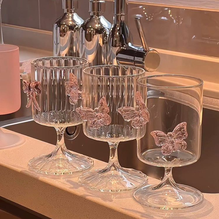 Designed for dreamers and romantics, each goblet boasts a clear, high-quality glass base with unique butterfly ornaments that make it as much art as it is functional drinkware.