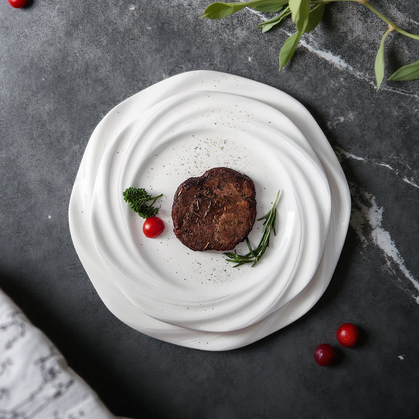 Crafted with artistic precision, the plate features a concentric wave-inspired design that creates a striking visual centerpiece.
