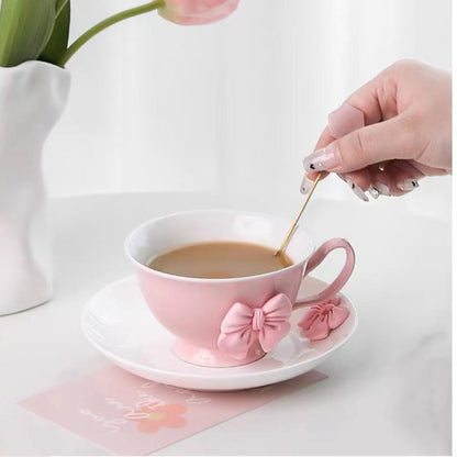 a beautifully feminine drinkware collection adorned with soft pink bow embellishments. 