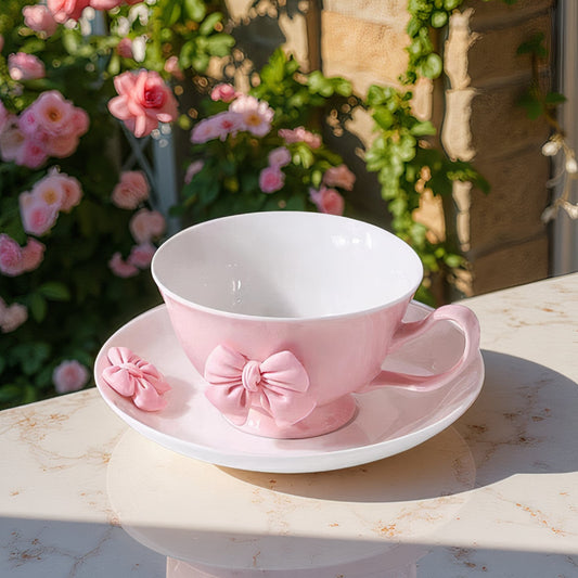 a beautifully feminine drinkware collection adorned with soft pink bow embellishments. 